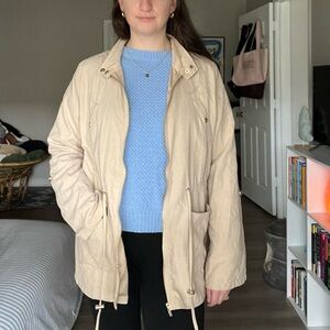 Lightweight khaki colored zip up jacket
